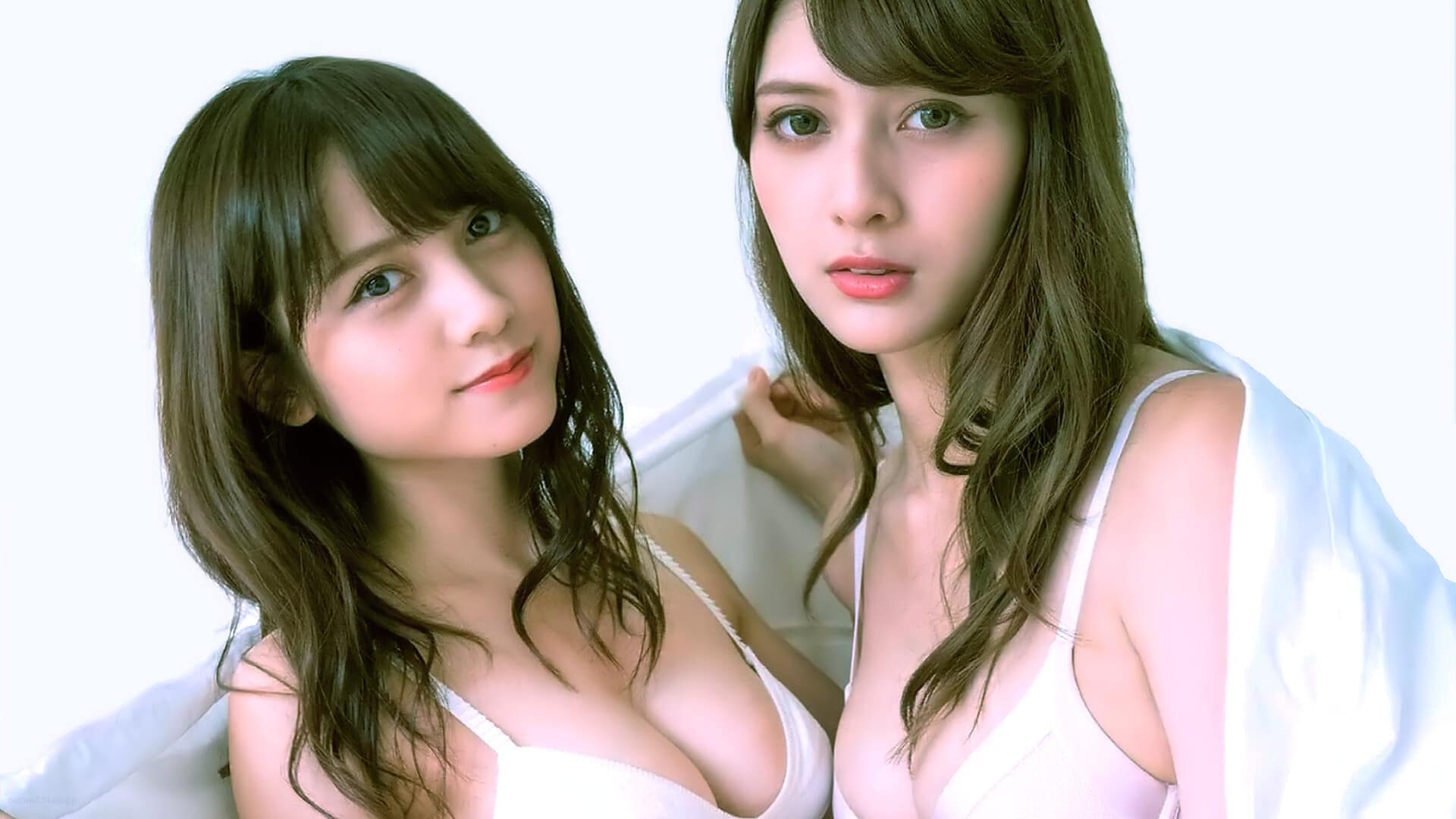 Brown-haired sexy Asian models posing in swimsuit