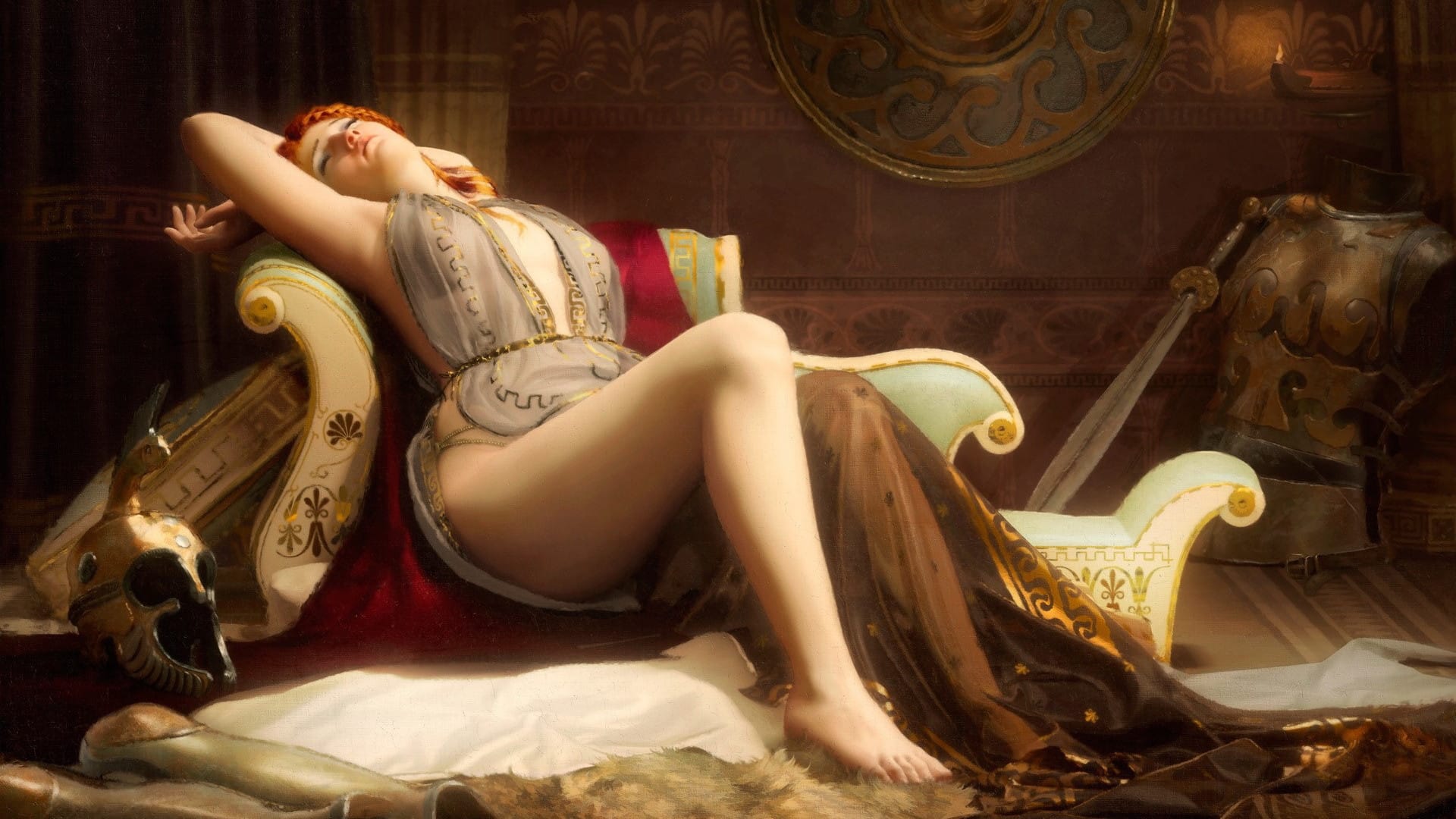 Red-haired Caucasian woman in an elegant dress posing gracefully on a sofa, perfect for a sophisticated wallpaper.